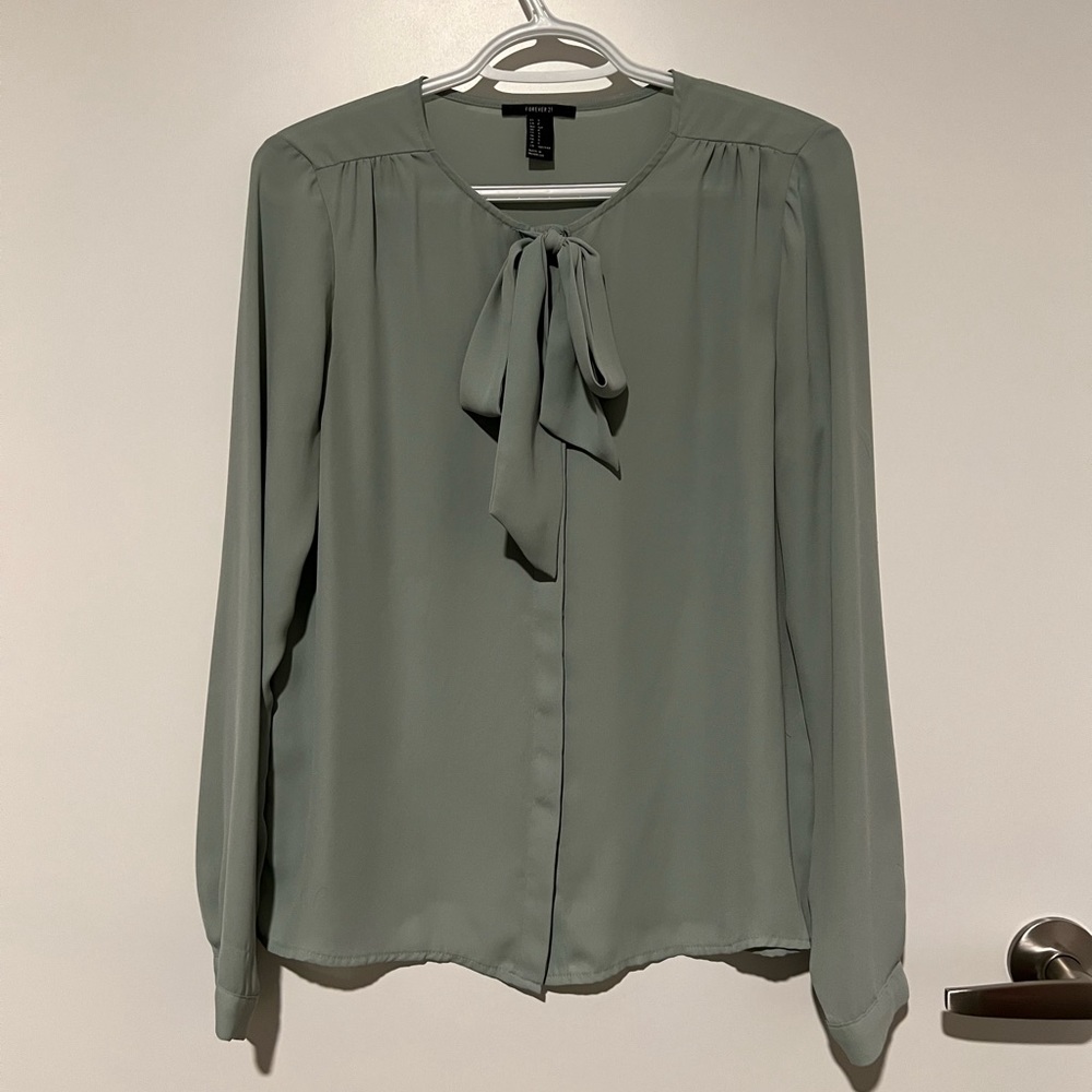 Neck tie satin loses fit blouse. Size S